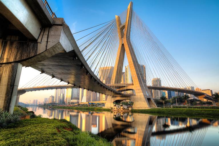 The Octavio Frias de Oliveira bridge is a cable-stayed bridge in São Paulo, Brazil over the Pinheiros River, opened in May 2008. The bridge is 138 metres (453 ft) tall, and connects Marginal Pinheiros to Jornalista Roberto Marinho Avenue in the south area of the city. It is named after Octavio Frias de Oliveira.